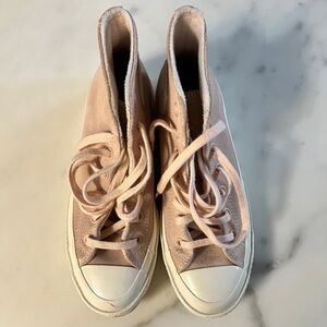 Women's Pink Suede Converse Chuck 70 High-Top Sneakers.